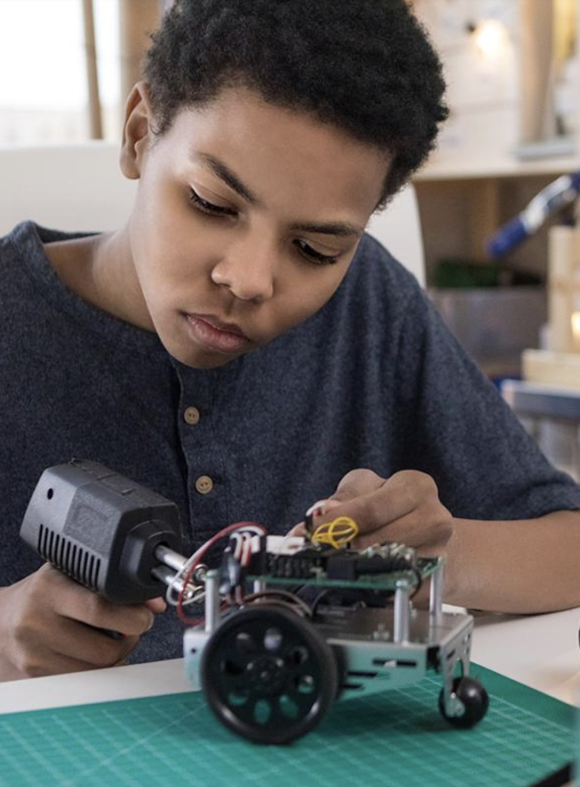 student works on robot