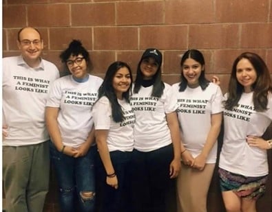 feminist club members at an in person meeting